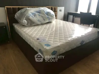 Modern bedroom with new mattress and stylish furniture, perfect for comfort and relaxation.