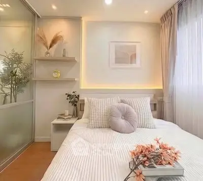 Cozy and stylish bedroom with modern decor and soft lighting, perfect for relaxation.