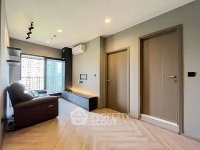 Modern living room with sleek design and city view balcony