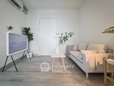Modern minimalist living room with stylish furniture and indoor plants
