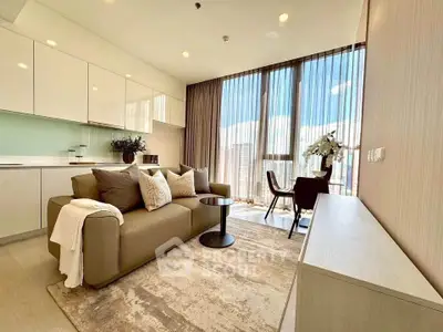 Modern living room with elegant decor and large windows offering city views