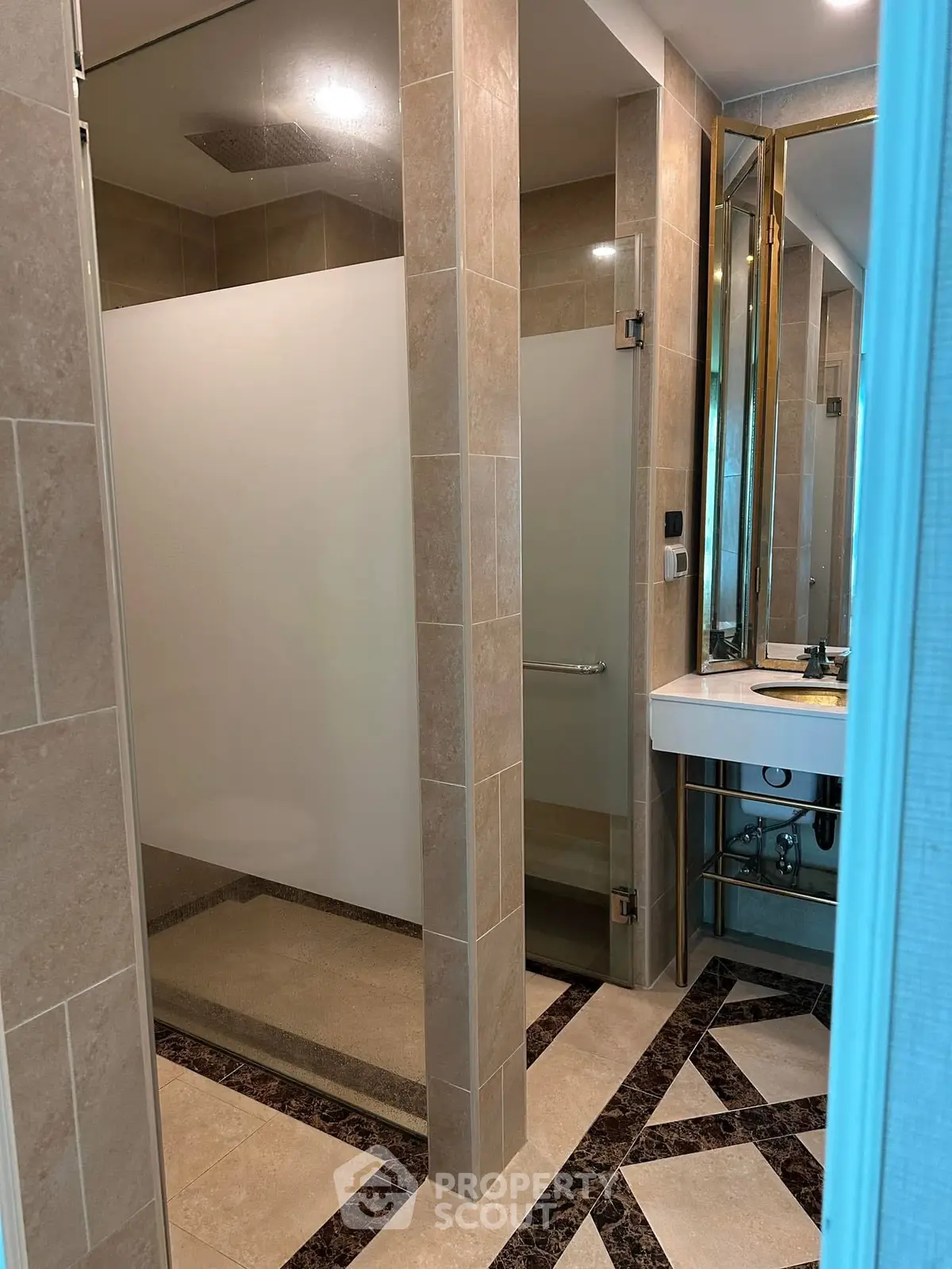 Luxurious bathroom with modern shower and elegant tile design