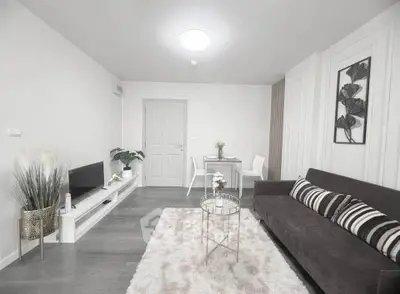 Modern living room with sleek furniture and stylish decor