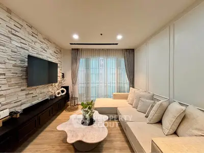 Modern living room with stylish decor and cozy seating area
