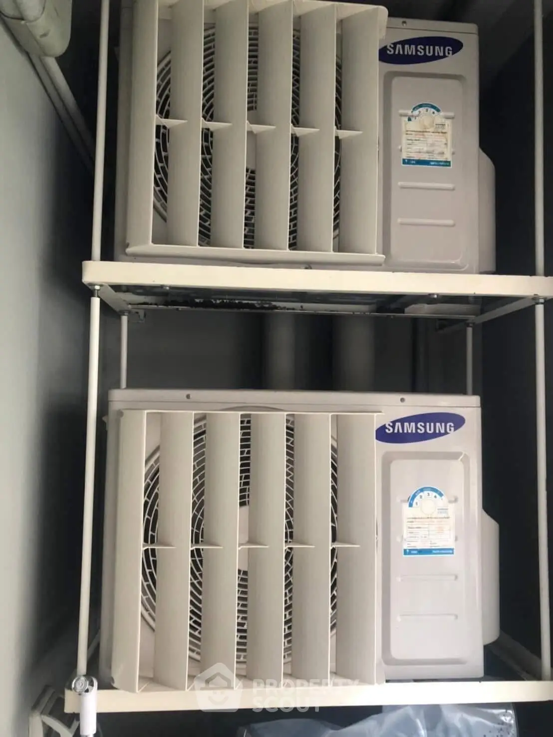 Dual Samsung air conditioning units installed in a modern building for efficient climate control.