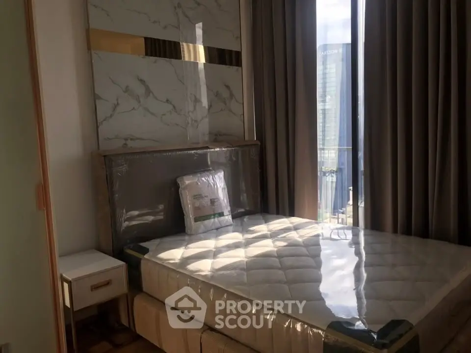 Luxurious bedroom with modern decor and stunning city view