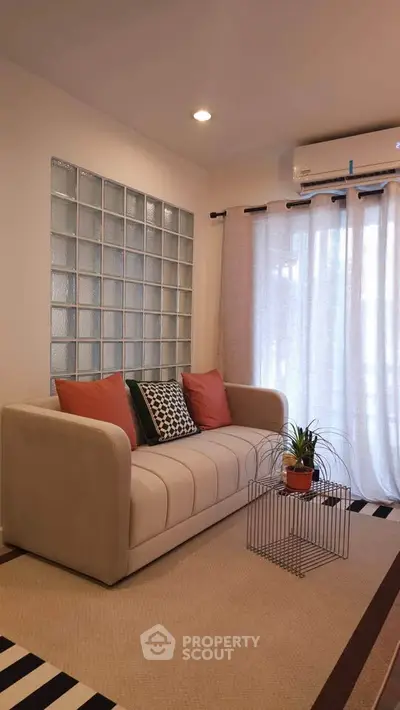 Cozy living room with modern sofa and stylish decor