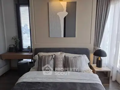 Luxurious modern bedroom with stylish decor and city view