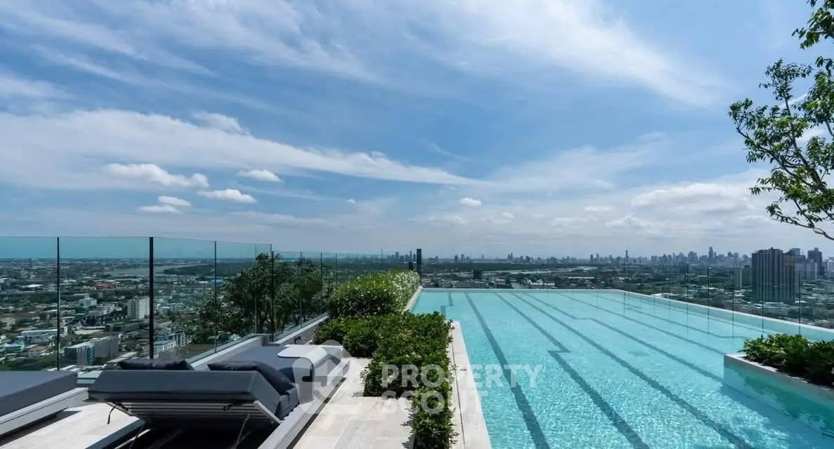 Luxurious rooftop infinity pool with stunning city skyline view