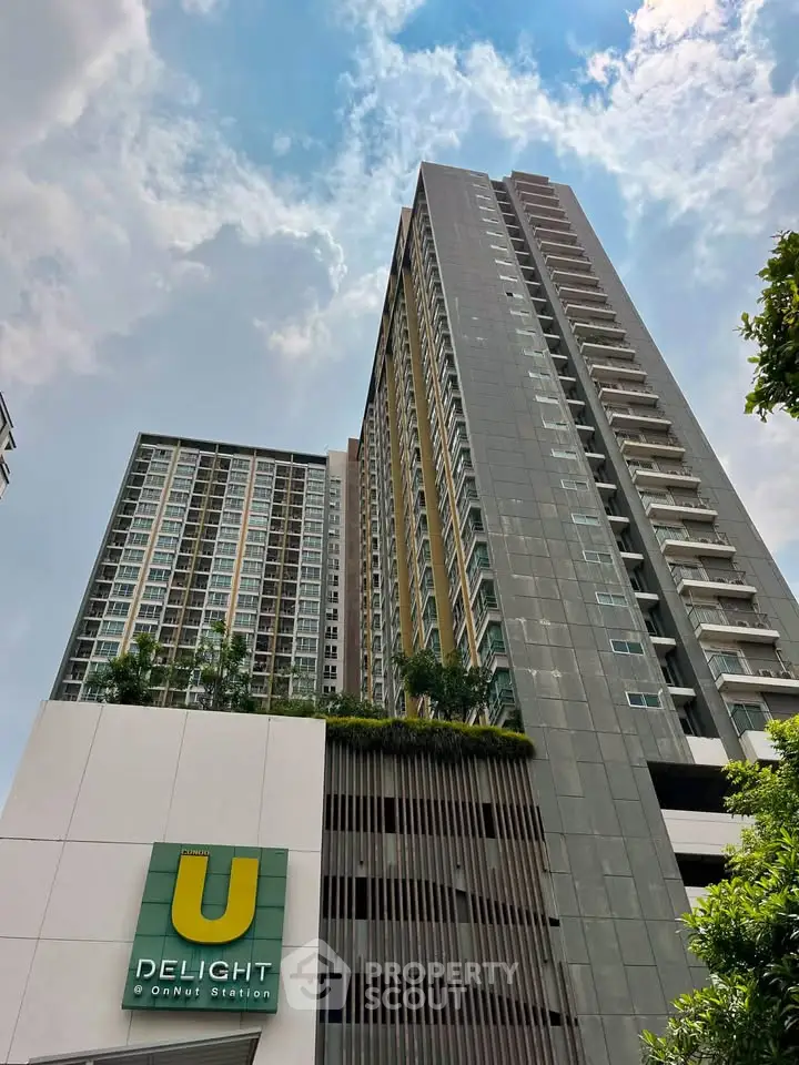 Stunning high-rise condominium with modern architecture and lush greenery at U Delight Onnut Station.