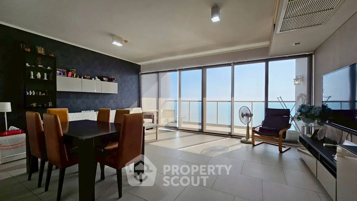 Spacious living room with ocean view and modern decor