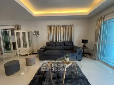 Modern living room with stylish furniture and ambient lighting