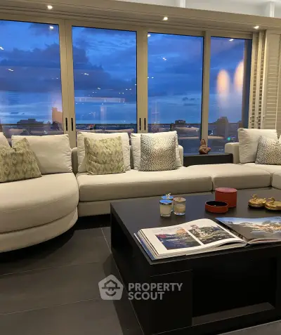 Luxurious living room with stunning city view and elegant decor