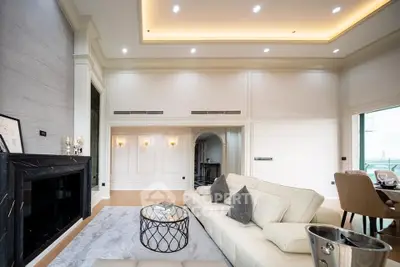 Luxurious living room with elegant decor and modern lighting
