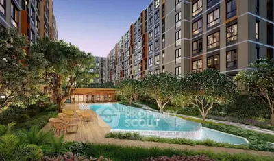 Luxurious modern apartment complex with stunning pool and lush greenery