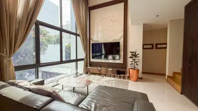 Luxurious living room with modern decor and large window view