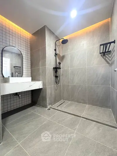 Modern bathroom with sleek shower and stylish tile design