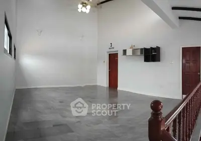Spacious empty room with high ceiling and modern design