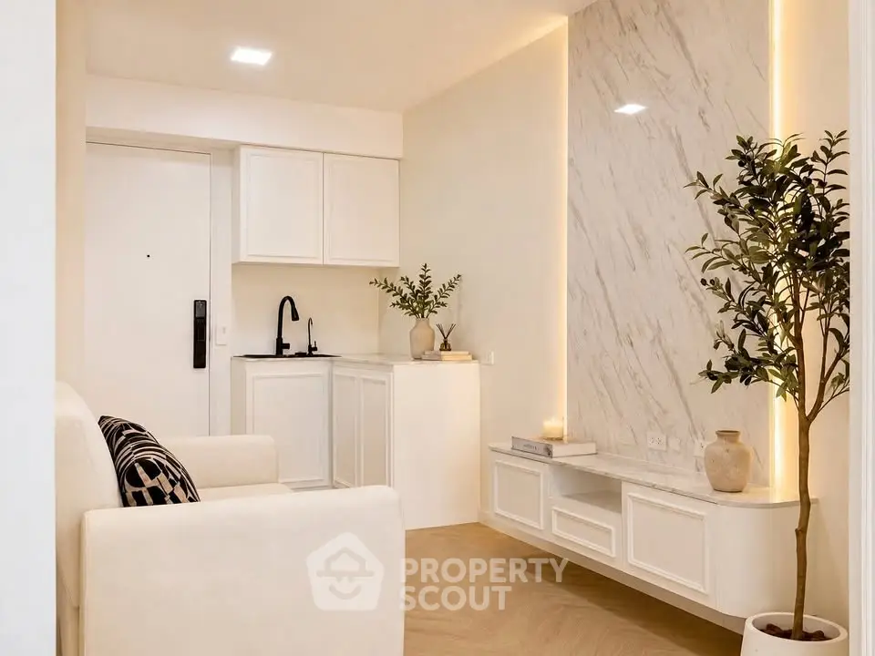 Modern living room with elegant marble accent wall and cozy seating area