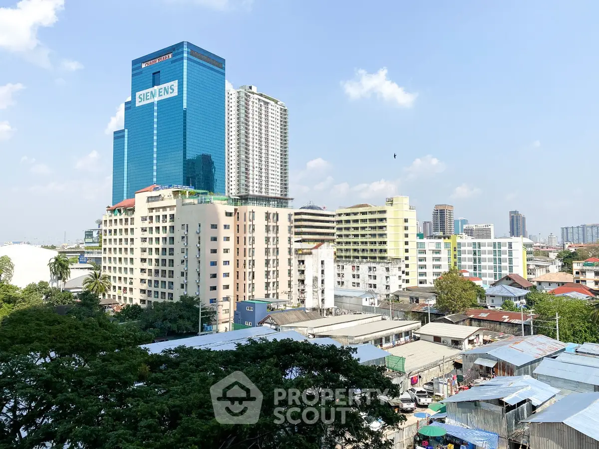 Stunning cityscape view featuring modern high-rise buildings and vibrant urban landscape.