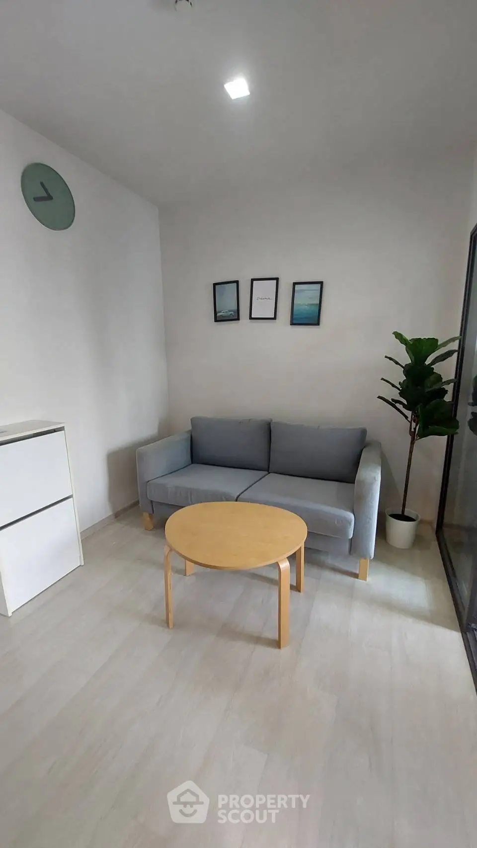 Cozy minimalist living room with modern decor and natural light