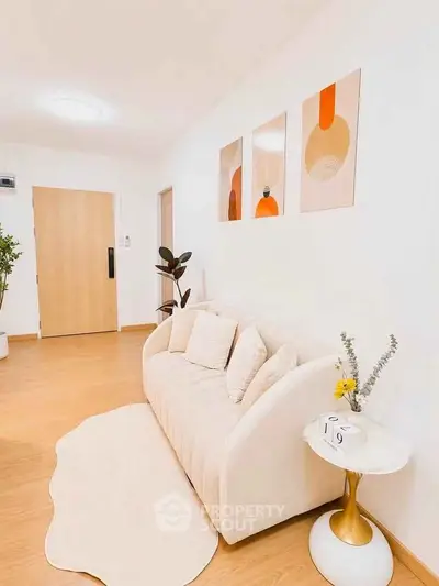 Stylish modern living room with elegant decor and cozy seating area.