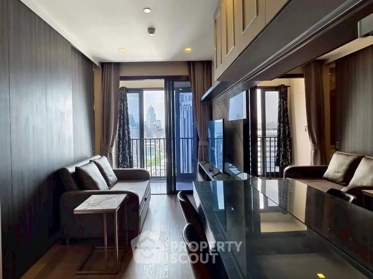 Modern living room with city view and balcony access, featuring sleek furniture and elegant decor.