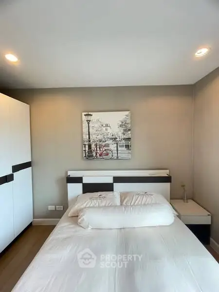 Modern bedroom with stylish decor and cozy ambiance