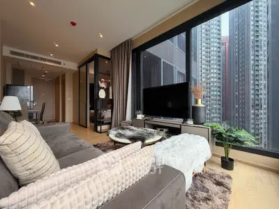 Luxurious living room with stunning city view in modern high-rise apartment