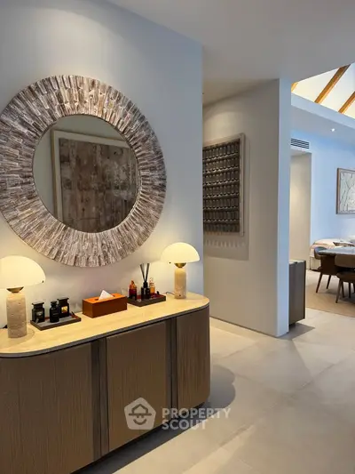 Elegant modern living room with stylish decor and ambient lighting