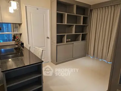 Modern study room with built-in shelves and elegant decor