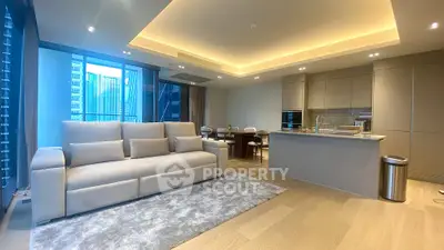 Luxurious modern living room with open kitchen and elegant lighting