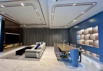 Luxurious modern living room with elegant dining area and stylish decor