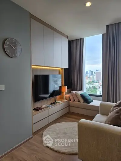 Cozy living room with city view, modern decor, and natural light