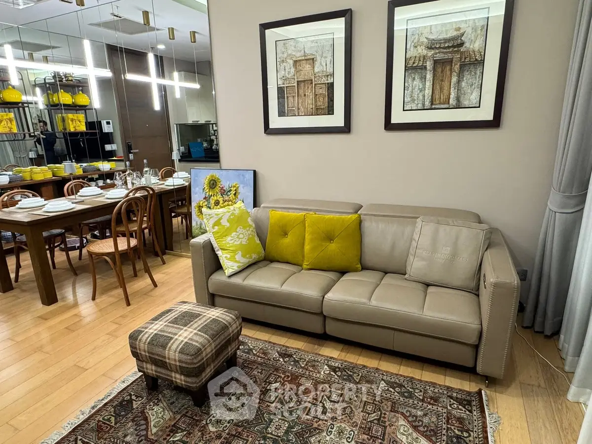 Chic living room with elegant dining area, stylish decor, and cozy seating in modern apartment.