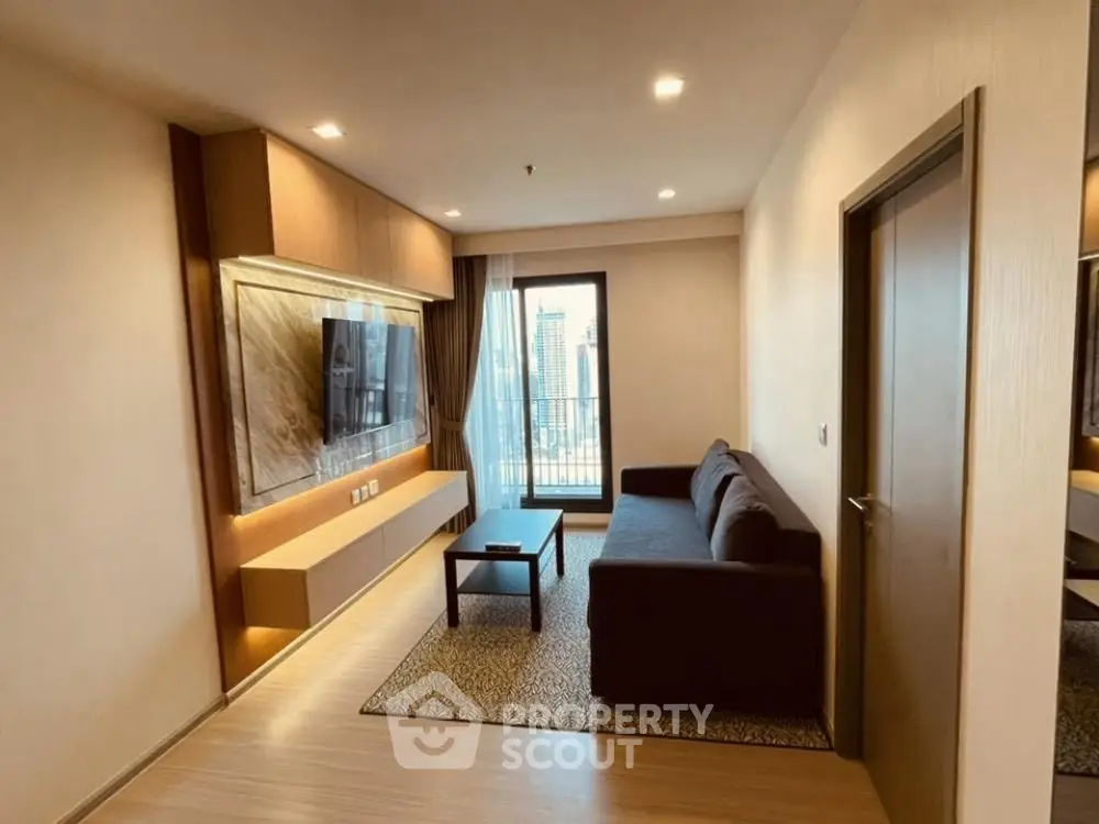 Modern living room with sleek design and city view balcony access.