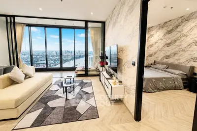 Luxurious living room with stunning city view and elegant bedroom
