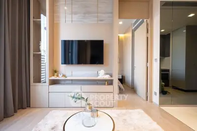 Modern living room with sleek TV setup and stylish decor