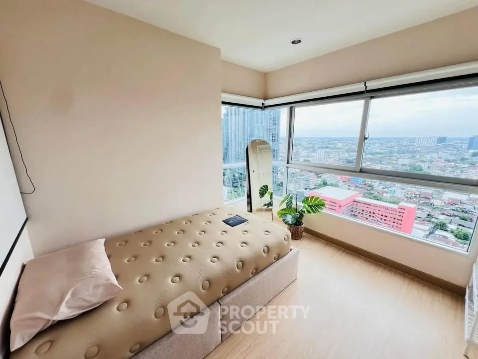 Modern bedroom with panoramic city view and stylish decor