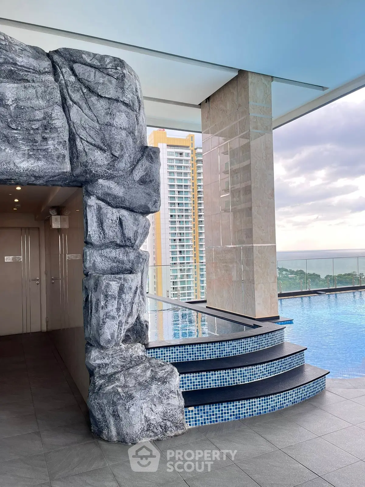 Luxurious rooftop pool with stunning city view and modern design