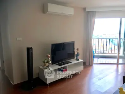 Modern living room with balcony view and stylish decor