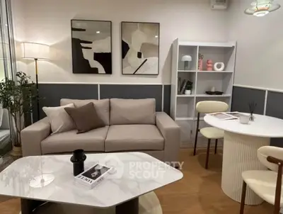 Stylish modern living room with elegant decor and cozy seating area, perfect for relaxation and entertaining.
