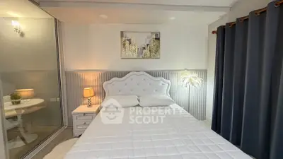 Cozy bedroom with elegant decor and plush bedding in modern apartment