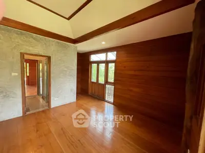 Spacious wooden interior with natural light and rustic charm
