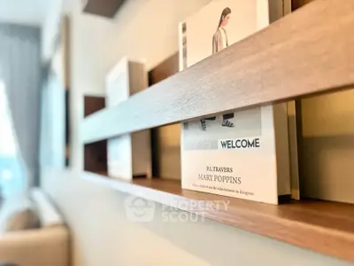 Stylish living room with modern wooden bookshelf and cozy decor