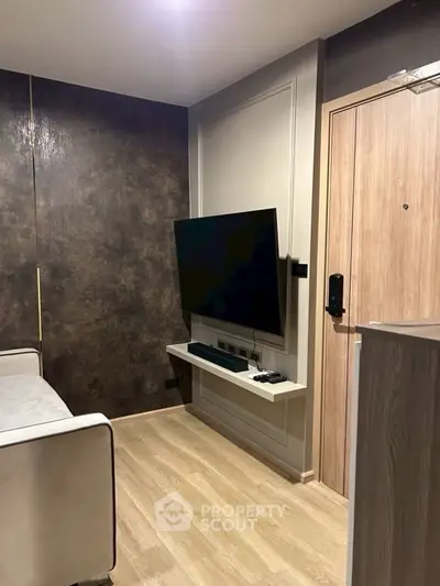 Modern living room with sleek TV setup and stylish decor