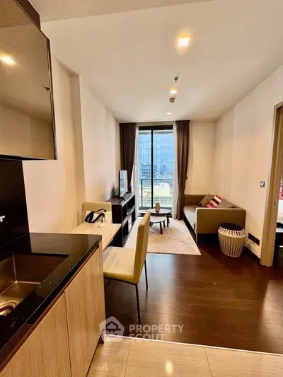 Modern living room with city view, open layout, and stylish furnishings in a high-rise apartment.