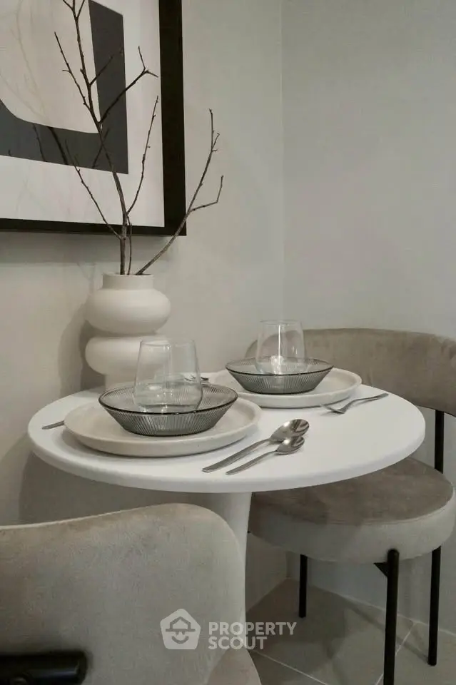 Stylish modern dining nook with elegant table setting and minimalist decor
