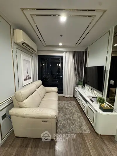 Luxurious living room with elegant decor and city view