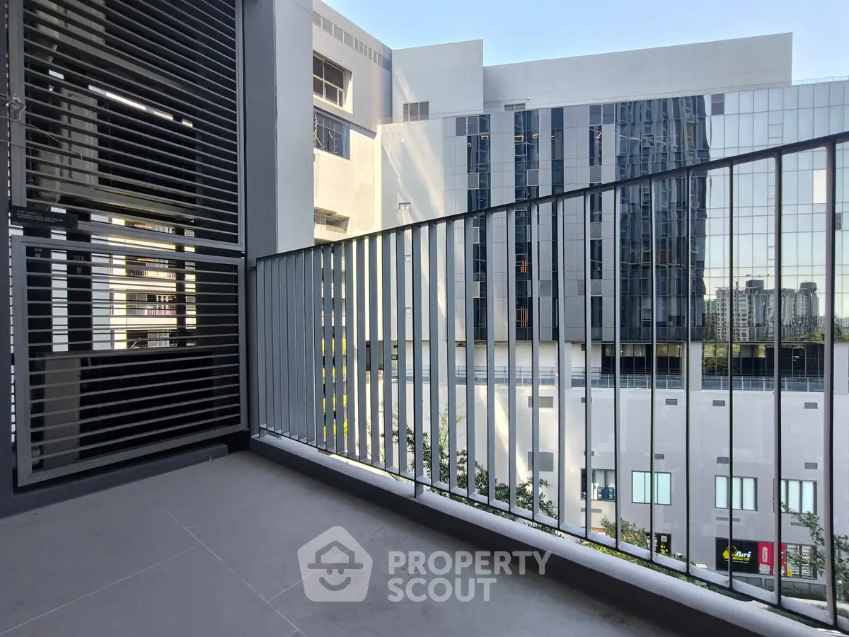 Modern balcony with city view in contemporary apartment building